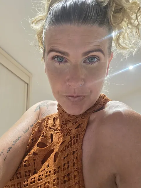 Curly Blonde MILF in a Dress Strips for Selfies – photo 2 of 10