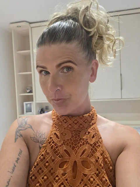 Curly Blonde MILF in a Dress Strips for Selfies – photo 9 of 10