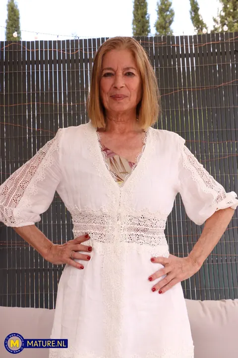 Marta Style: Slim Spanish MILF Shows Her Natural Tits on the Patio – photo 6 of 21