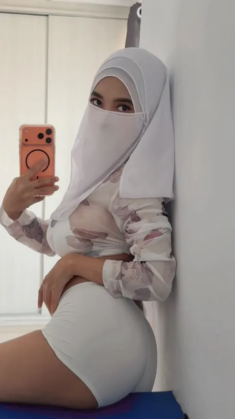 Slim Arab Woman with Big Tits Poses in a White Bra and Thong – photo 11 of 20