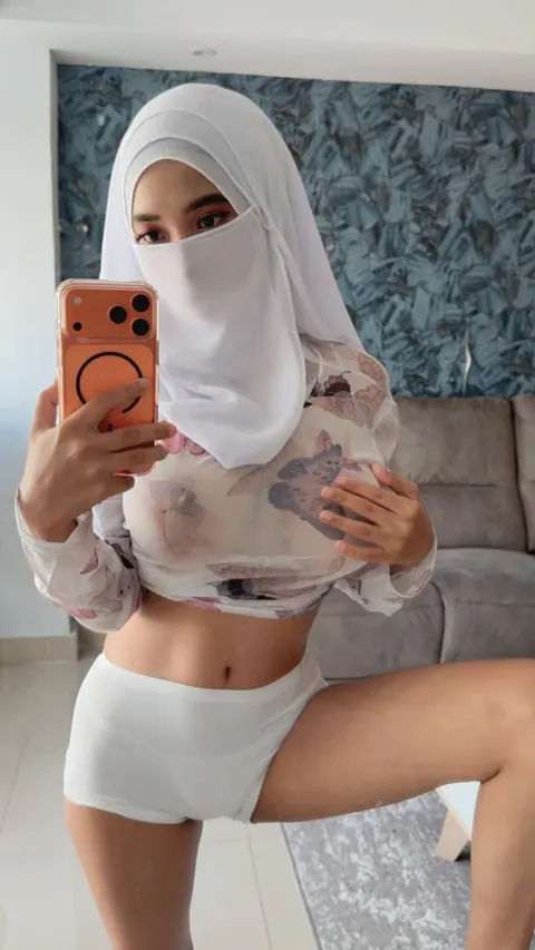 Slim Arab Woman with Big Tits Poses in a White Bra and Thong – photo 8 of 20