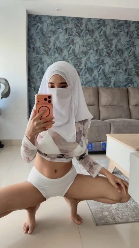 Slim Arab Woman with Big Tits Poses in a White Bra and Thong – photo 9 of 20