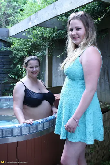 Mature Women with Big Tits Kiss and Lick in a Hot Tub
