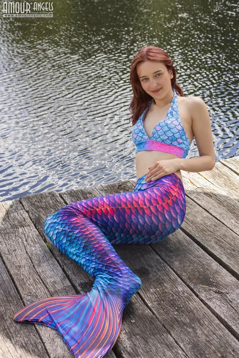 Redhead Strips Out of Her Cosplay Costume on a Dock – photo 4 of 20