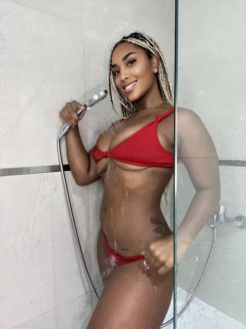Curvy Ebony Babe with Big Natural Tits Smiles in a Red Bikini in the Bathroom – photo 18 of 20