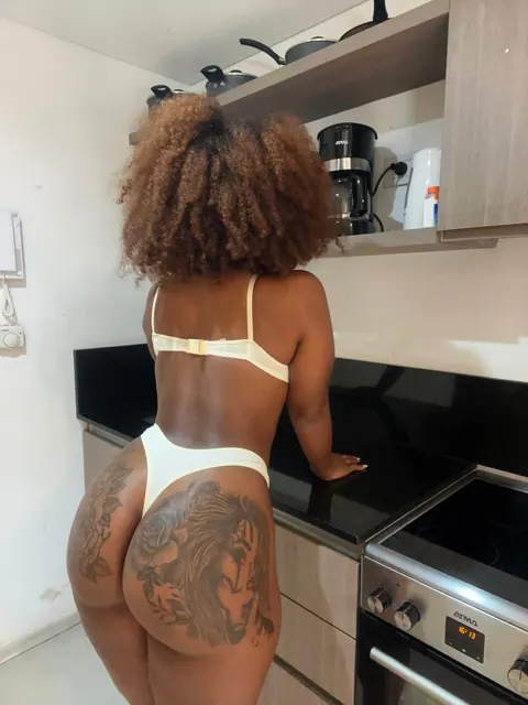 Ebony Babe with Big Tits Shows Off Her Tattooed Ass in a Thong – photo 6 of 20