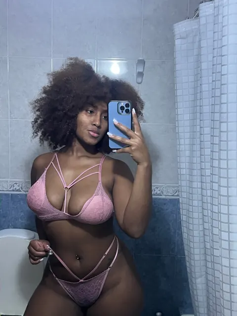 Ebony BBW with Big Tits and Tattooed Ass Strips Nude – photo 13 of 20