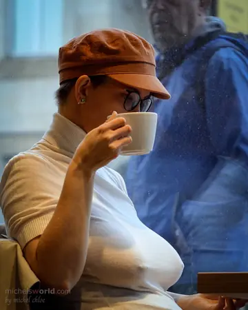 Woman in Glasses Exposes Her Big Natural Tits in Public Bondage