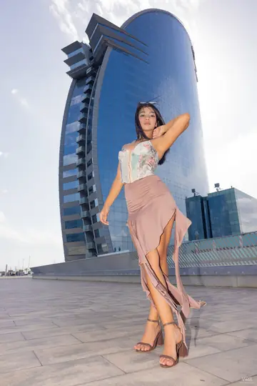 Latina Slips Out of Her Dress and Poses Nude