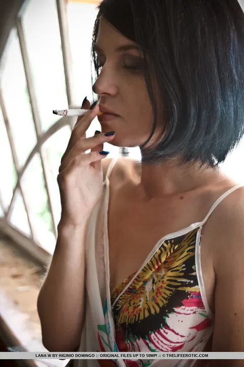 Short Haired Brunette Smokes a Cigarette Then Spreads Her Hairy Pussy – photo 3 of 16