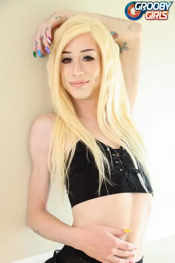 Blonde Trans Woman Undresses and Poses Nude on Her Knees