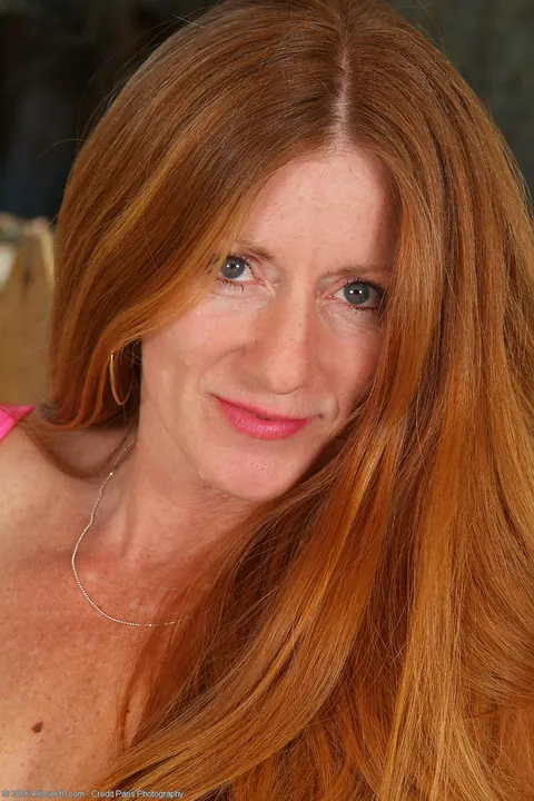 Curvy Redhead MILF Strips Off Her Lingerie by the Pool – photo 12 of 20