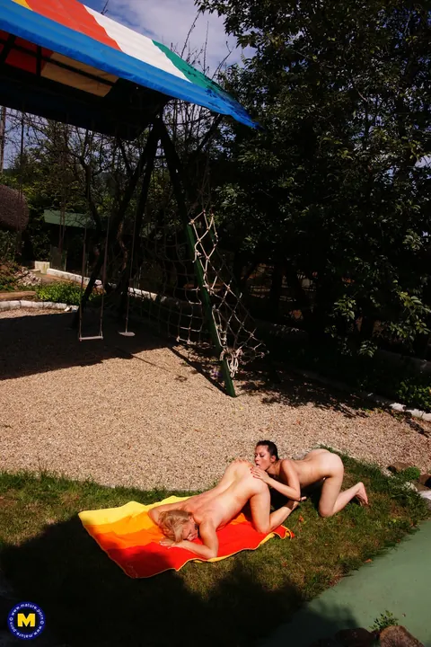 Mature Lesbians with Big Tits Lick Pussy Outdoors in Bikinis – photo 20 of 21