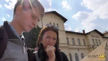 Woman Undresses for a Threesome in a Public Place