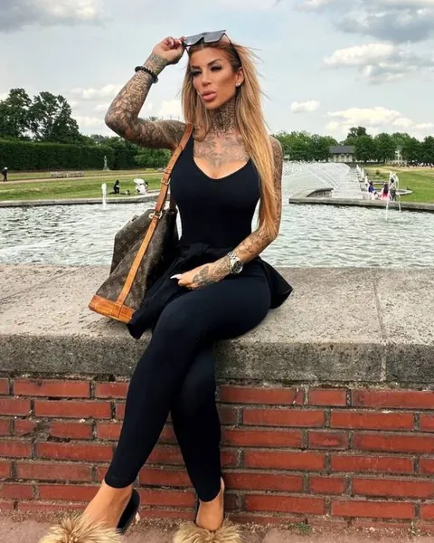 Tattooed Amateur Model Undresses and Poses Across Multiple Sets – photo 9 of 12
