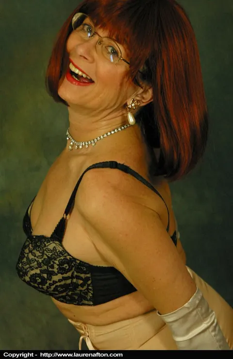 Busty Redhead MILF Poses in Lingerie, Stockings and Glasses – photo 8 of 12