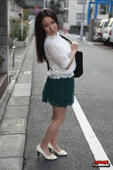 Sakura Anna: Japanese Brunette Lifts Her Skirt to Flash Outdoors – photo 7 of 15