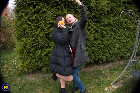 European MILFs Snap Selfies Outdoors in Jeans and Kiss – photo 13 of 21