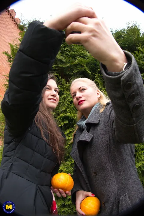 European MILFs Snap Selfies Outdoors in Jeans and Kiss – photo 11 of 21
