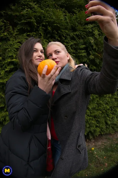 European MILFs Snap Selfies Outdoors in Jeans and Kiss – photo 12 of 21