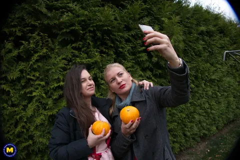 European MILFs Snap Selfies Outdoors in Jeans and Kiss – photo 16 of 21