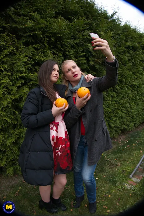 European MILFs Snap Selfies Outdoors in Jeans and Kiss – photo 17 of 21