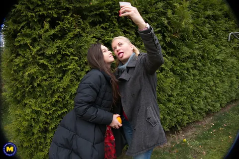 European MILFs Snap Selfies Outdoors in Jeans and Kiss – photo 18 of 21