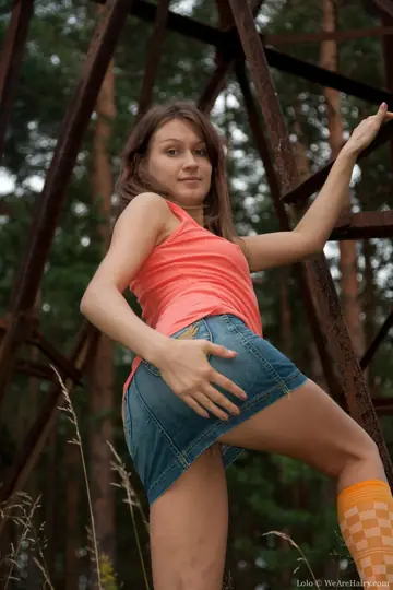 Petite Slim Brunette Fingers Her Hairy Bush in the Forest
