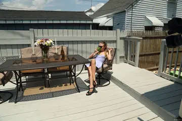 Blonde in Heels and Glasses Spreads Outdoors