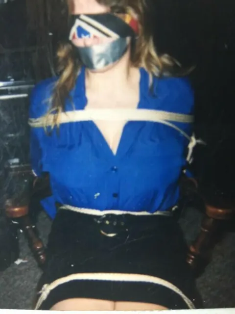 Busty Woman Restrained in Lingerie, Skirt and Heels for BDSM – photo 13 of 14