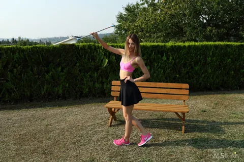 Kira Dutch: Skinny Redhead Lesbian Takes a Baton in Her Pussy Outdoors – photo 1 of 16