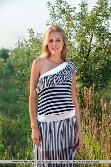 Tall European Blonde Strips Nude in the Forest
