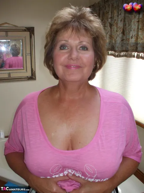 Bustybliss: Curvy Mature Brunette Gives a Handjob in the Bathroom – photo 1 of 20