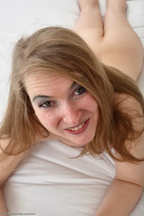 Thick Blonde Shows Her Hairy Pussy on the Bed – photo 21 of 21