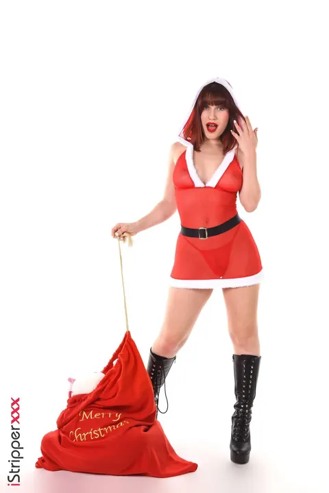 Busty Redhead Sheds Santa Suit for Dildo Play – photo 1 of 15