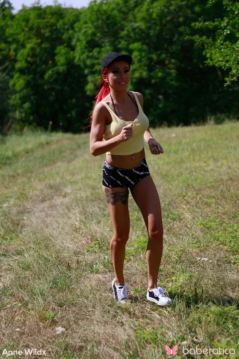 Redhead Bares Her Big Tits and Toys Herself in a Tent – photo 1 of 15