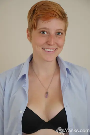 Redhead with Short Hair Fingers and Toys Her Pussy