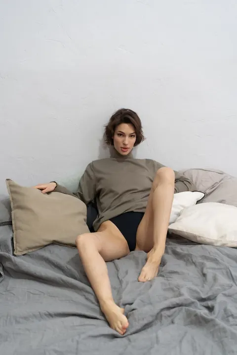 Tall Slim Short-Haired Model Poses in Lingerie, Socks and a Bodysuit – photo 8 of 20