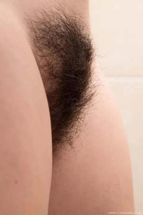 Brunette Strips Off Her Panties to Finger Her Hairy Pussy – photo 16 of 17