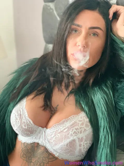 Tattooed Busty Brunette Poses in Lingerie While Smoking – photo 8 of 15