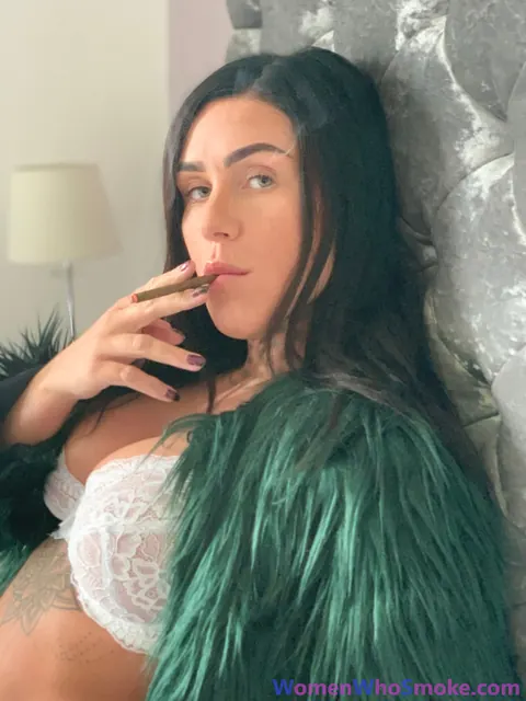 Tattooed Busty Brunette Poses in Lingerie While Smoking – photo 4 of 15