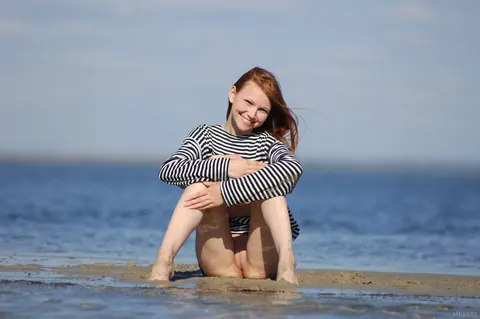 Redhead with Small Tits Spreads Her Shaved Pussy on the Beach – photo 21 of 21