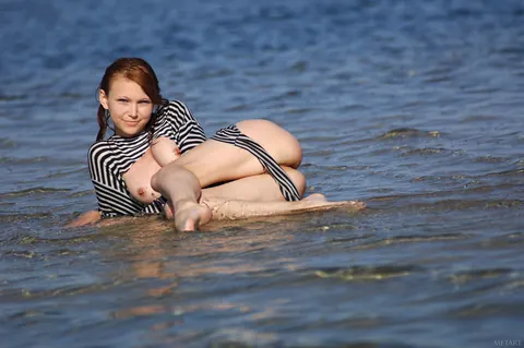 Redhead with Small Tits Spreads Her Shaved Pussy on the Beach – photo 5 of 21