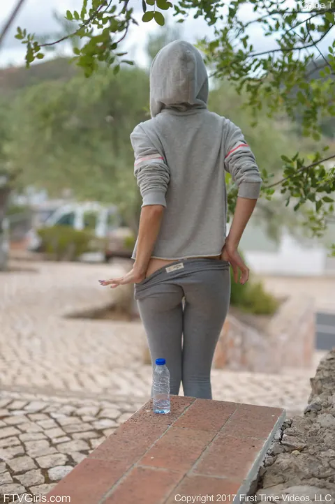 Skinny Blonde in Yoga Pants Shows Her Small Tits Outdoors – photo 16 of 20
