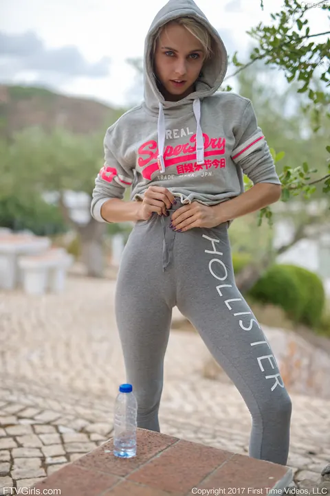 Skinny Blonde in Yoga Pants Shows Her Small Tits Outdoors – photo 19 of 20