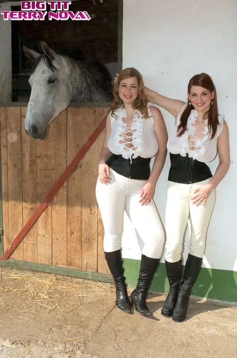Terry Nova: Two Busty Redhead MILFs in Riding Attire Kiss Outdoors – photo 2 of 16