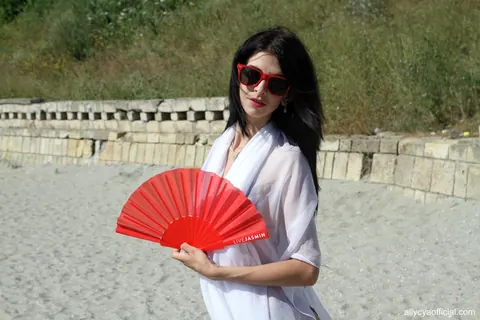 Allycya Silk: Brunette in a Bikini and Glasses Poses on the Beach – photo 10 of 15
