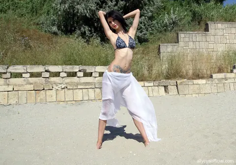 Allycya Silk: Brunette in a Bikini and Glasses Poses on the Beach – photo 5 of 15