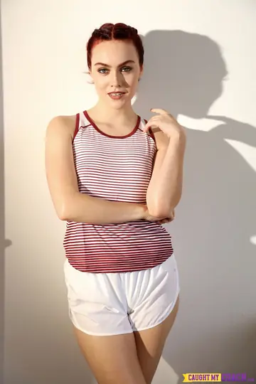 Tall Redhead in Shorts Sucks and Fucks Her Coach in the Office