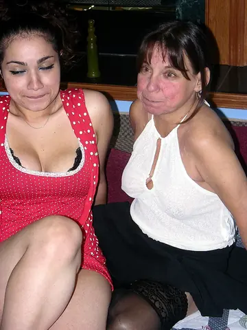 Blonde MILF and Petite Woman Share a Dildo in Stockings